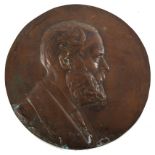 A copper relief portrait of Charles Stewart Parnell, 8" (20cm) diameter.