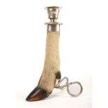 Deer's hoof candlestick by Rowland Ward, the silver plated sconce stamped "Rowland Ward -