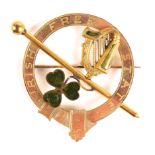 1920s Irish Free State brooch. A gilt metal pin-back brooch in the form of a penannular cloak pin