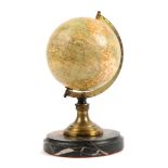 Circa 1890 A French terrestrial desk globe by E. Bertaux, Paris, the 4" globe with printed gores,