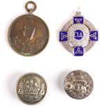 Irish militaria, a Victorian tunic button of the 87 South Cork Militia; a Royal Irish Rifles