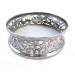Irish silver miniature dish ring, of typical waisted form, pierced and repousse decorated with