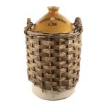 Powers Whiskey stoneware five-gallon whiskey jar in wicker basket, numbered A388.