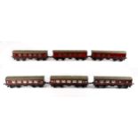 Hornby O Gauge No.2, six all 1st coaches, LMS crimson, RN 402. Provenance: Kevin Nolan collection.