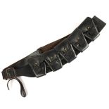 Royal Irish Constabulary bandolier. A black leather five-pouch bandolier dated 1918 and maker's mark