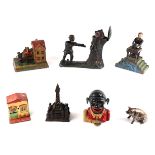 A collection of six cast metal novelty money boxes, Teddy and the Bear, Magician Bank, Dinah,