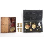 A collection of eight various brass coin weights and apothecaries' weights and two bankers'