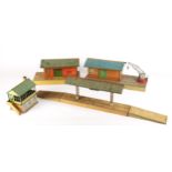 Hornby O Gauge, tinplate lineside items. No. 1 goods shed, 1928, aged and play-worn; No. 2 goods