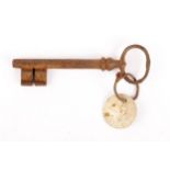 Kilmainham Gaol cell key. A Victorian key with white metal disk attached numbered '27'. One of a