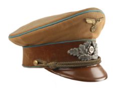 1933-45 German NSDAP Political Leader's visor cap, of tan coloured cloth with blue piping, brown