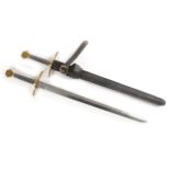 A pair of medieval-style swords. Replica medieval bastard swords, the double edged, diamond cross-