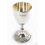 A silver goblet, , the interior gilt, the base relief decorated with roses, thistles, daffodils