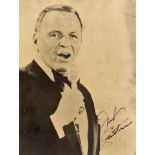 Frank Sinatra autograph signature. A photograph of Sinatra signed lower right, 10" x 8" (25 x 20cm),
