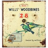 Advertising perpetual calendar promoting Will's Woodbines, two blue tits perched on a branch above