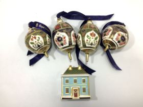 Five assorted Christmas themed Royal Crown Derby decorations and paperweight comprising 'Old Imari