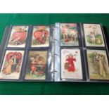 Approximately 104 standard postcards in an album on the theme of love ' particularly Valentine's