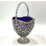 A George III silver sweatmeat or bon-bon basket in the neo-classical style, of circular tapering