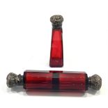 A Victorian ruby red faceted cut glass double-ended scent/perfume bottle, with ornately repousse