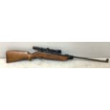 A Weihrauch HW 50.S .22/5.5mm air rifle, break-barrel, breach loading, stained beechwood stock,