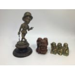 A 1920's brass Sir Kreemy Knut car mascot depicting a snooty gentleman wearing a suit, bowler hat