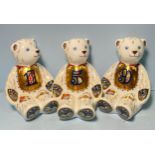 Three Royal Crown Derby Number Bears, '1' and '5' and '9', with printed marks to base, gold stoppers