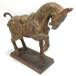 A cast metal/iron figure of a Chinese Tang 'style' burial horse, on plinth base, 30cm long