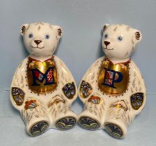 A pair of Royal Crown Derby Alphabet Bears, 'P' and 'M', with printed marks to base, gold stoppers