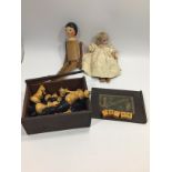 A Staunton pattern chess set, boxed, together with a Poker dice set, a small Armand Marseille doll