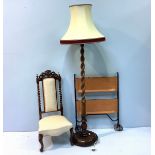 An oak barley-twist standard lamp, together with a Victorian nursing chair with barley-twist back