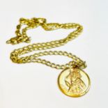 A 9ct yellow gold curb link chain, with a 9ct gold St Christopher pendant, chain measures 20
