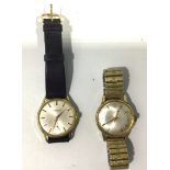 Two gents gold-plated wristwatches by J. W. Benson, both with silvered dials, one with batons