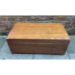 A Malaysian stained teak trunk, of rectangular form and plain design, the hinged top enclosing
