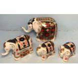 Four Royal Crown Derby elephant paperweights comprising 'Lucky Charm Old Imari Lucky Elephant',