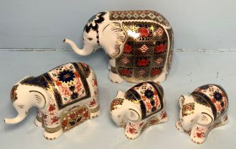 Four Royal Crown Derby elephant paperweights comprising 'Lucky Charm Old Imari Lucky Elephant',