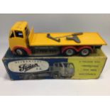 Another Shackleton Toy' mechanical Foden F G Vehicle, yellow cab and flatbed with red wheel