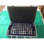 A coin case and key in very good condition containing five trays (each photographed), full with