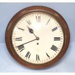A 19th century mahogany circular wall clock, the white enamel dial with Roman numerals denoting