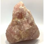 A very large Rose quartz crystal measuring approx. 20 x 25cm, 7.4kgs