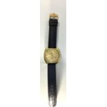 A gents gold-plated Omega Electronic F300Hz wristwatch, the gold dial with batons denoting hours and