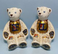 A pair of Royal Crown Derby Alphabet Bears, 'L' and 'F', with printed marks to base, gold stoppers