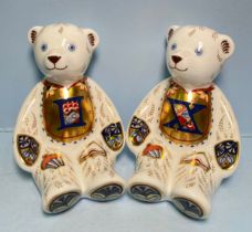 A pair of Royal Crown Derby Alphabet Bears, 'I' and 'X', with printed marks to base, gold stoppers