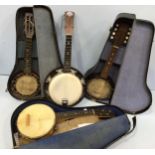 Four various banjo-ukuleles including three hard cases, including John Grey, 8" drum head, 5'