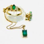 A 14ct yellow gold emerald and diamond ring weighing 2.9 grams, finger size N, together with an