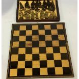 A Chinese chess set modelled as figures, pagodas and Foo Dogs in bronzed metal and brass, tallest