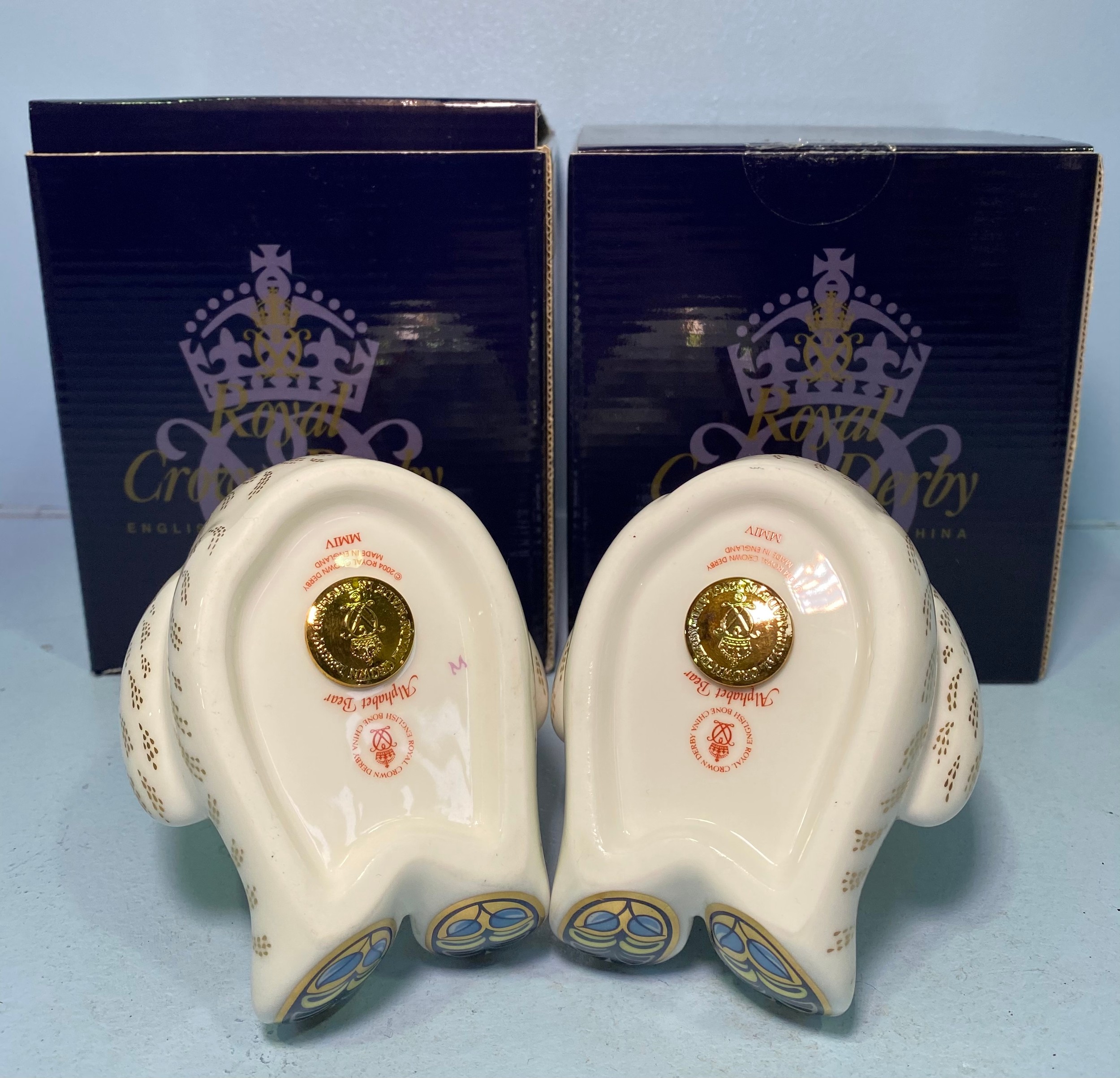 A pair of Royal Crown Derby Alphabet Bears, 'E' and 'Q', with printed marks to base, gold stoppers - Image 2 of 2