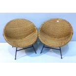 A pair of 1960s childs woven tub chairs on iron rod 'pylon' supports