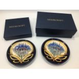 Two Moorcroft pottery pin dishes decorated in the 'Cornflower Cavalcade' pattern, designed by