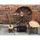 A carved spinning stool and part spinning wheel (as found), together with a wooden washing dolly and