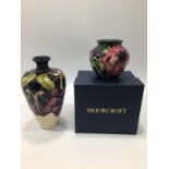 A Moorcroft pottery vase decorated in the 'Cherry' pattern, designed by Kerry Goodwin, mark for