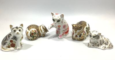 Five assorted Royal Crown Derby Kitten paperweights comprising 'Flora', an exclusive release as part